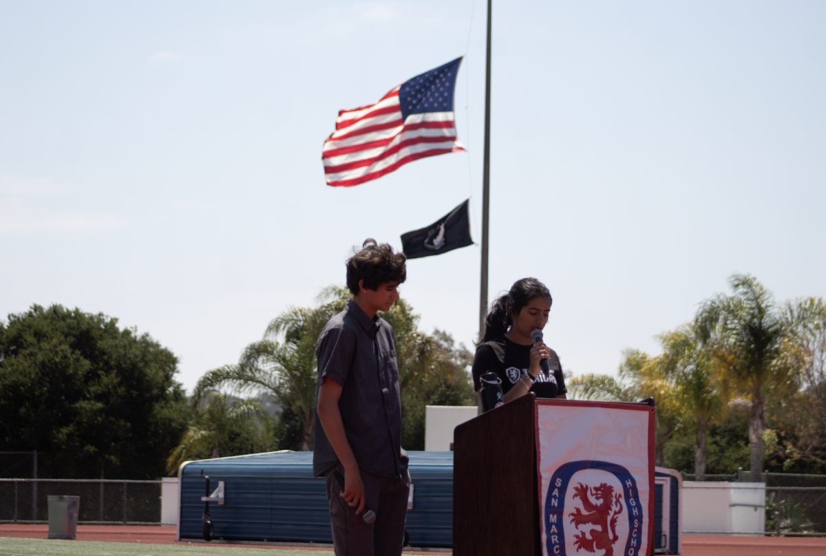 ASB President Kavea Suresh and Junior class president Kian Strenn giving a speech during the Memorial Day service at San Marcos on Friday.